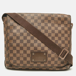 Louis Vuitton: Коричневая сумка 