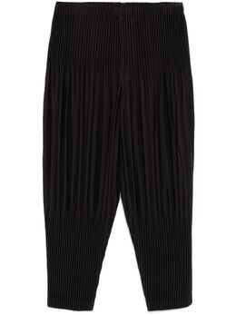 Homme Plissé Issey Miyake: Тёмные брюки 