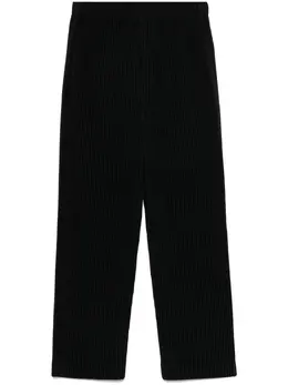 Homme Plissé Issey Miyake: Чёрные брюки 
