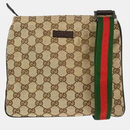 Gucci: Коричневая сумка  GG