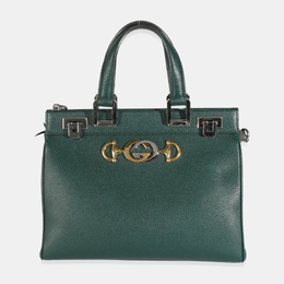Gucci: Тёмная сумка на руку  Zumi
