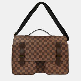 Louis Vuitton: Коричневая сумка 