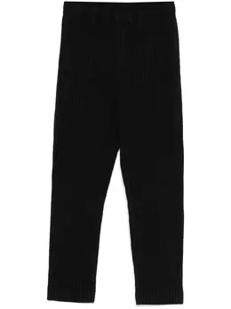 Homme Plissé Issey Miyake: Чёрные брюки 