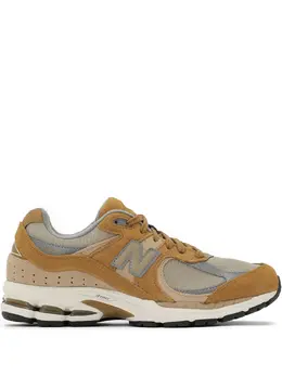 New Balance: Коричневые кроссовки  2002R