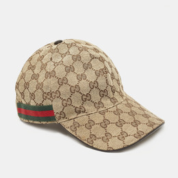 Gucci: Бежевая кепка  GG