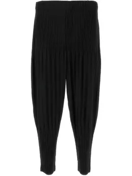 Homme Plissé Issey Miyake: Чёрные брюки 
