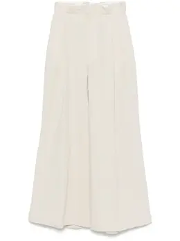 Maison Margiela: Светлые брюки 