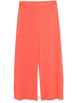 Pleats Please Issey Miyake: Оранжевые брюки 