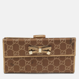 Gucci: Коричневый кошелёк  GG