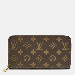 Louis Vuitton: Коричневый кошелёк  Zippy