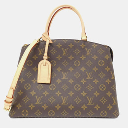 Louis Vuitton: Коричневая сумка 