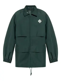 Lacoste: Зелёная куртка 