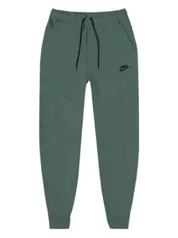 Nike: Зелёные брюки  Tech