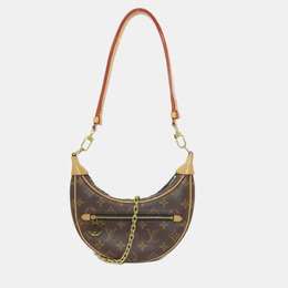 Louis Vuitton: Коричневая сумка 
