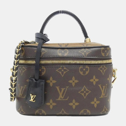 Louis Vuitton: Коричневая сумка 