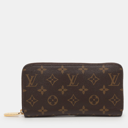 Louis Vuitton: Коричневый кошелёк  Zippy