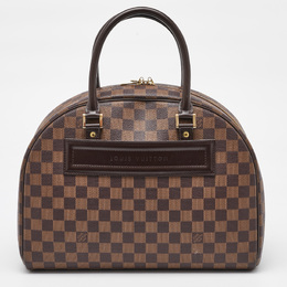 Louis Vuitton: Коричневая сумка 
