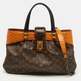 Louis Vuitton: Коричневая сумка 