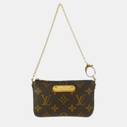 Louis Vuitton: Коричневая сумка  Pochette Milla PM