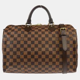 Louis Vuitton: Коричневая сумка  Speedy