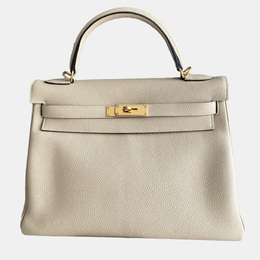 Hermes: Бежевая сумка на руку  Kelly