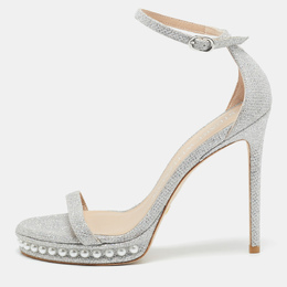Stuart Weitzman: Серебристые сандалии  Nudist
