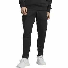 adidas: Спортивные брюки  Essentials