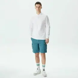 LACOSTE: Зелёные шорты 