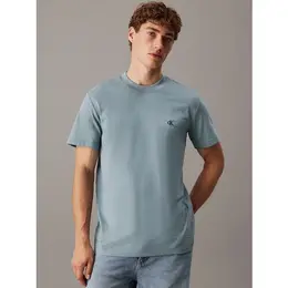 Calvin Klein Jeans: Зелёная футболка 