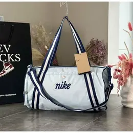 NIKE: Голубая сумка 