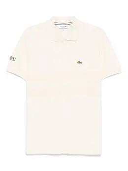 Lacoste: Бежевое поло 