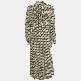 Valentino: Бежевое платье 