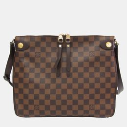 Louis Vuitton: Коричневая сумка 