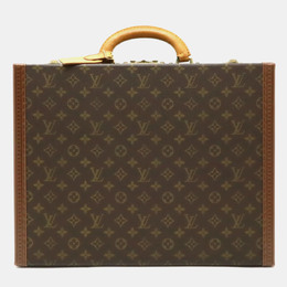 Louis Vuitton: Коричневая дорожная сумка 