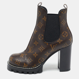 Louis Vuitton: Коричневые ботинки 