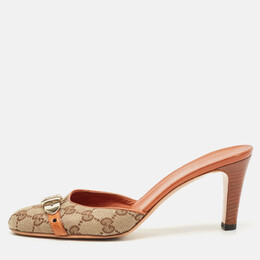 Gucci: Коричневые сабо 