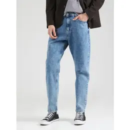 Tommy Jeans: Зауженные джинсы 