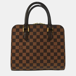 Louis Vuitton: Коричневая сумка 