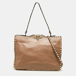 Valentino: Бежевая сумка на руку  Rockstud