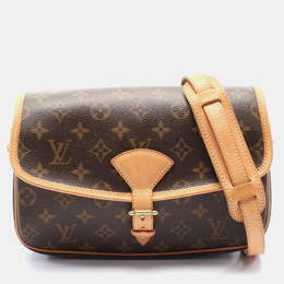 Louis Vuitton: Коричневая сумка 