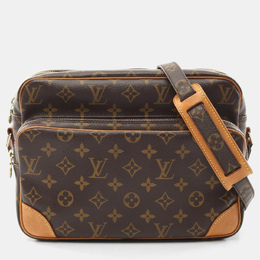 Louis Vuitton: Коричневая сумка 