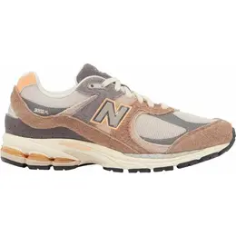New Balance: Серые кроссовки 
