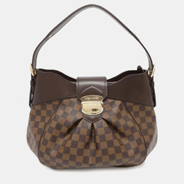 Louis Vuitton: Красная сумка 