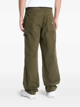 Tommy Jeans: Зелёные джинсы 