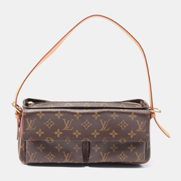 Louis Vuitton: Коричневая сумка 