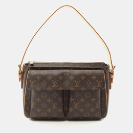 Louis Vuitton: Коричневая сумка 
