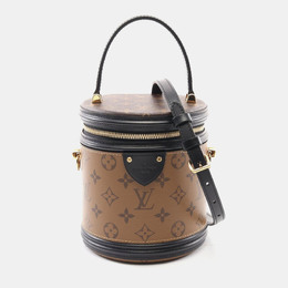 Louis Vuitton: Коричневая сумка 