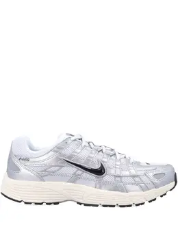 Nike: Серебристые кроссовки 