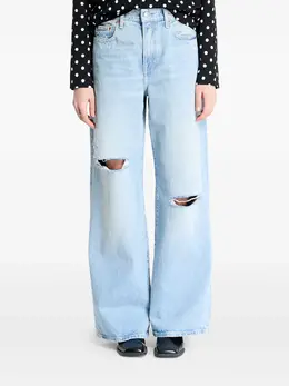 Calvin Klein Jeans: Рваные джинсы 