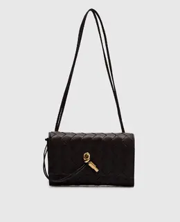 Bottega Veneta: Коричневі клатчі 